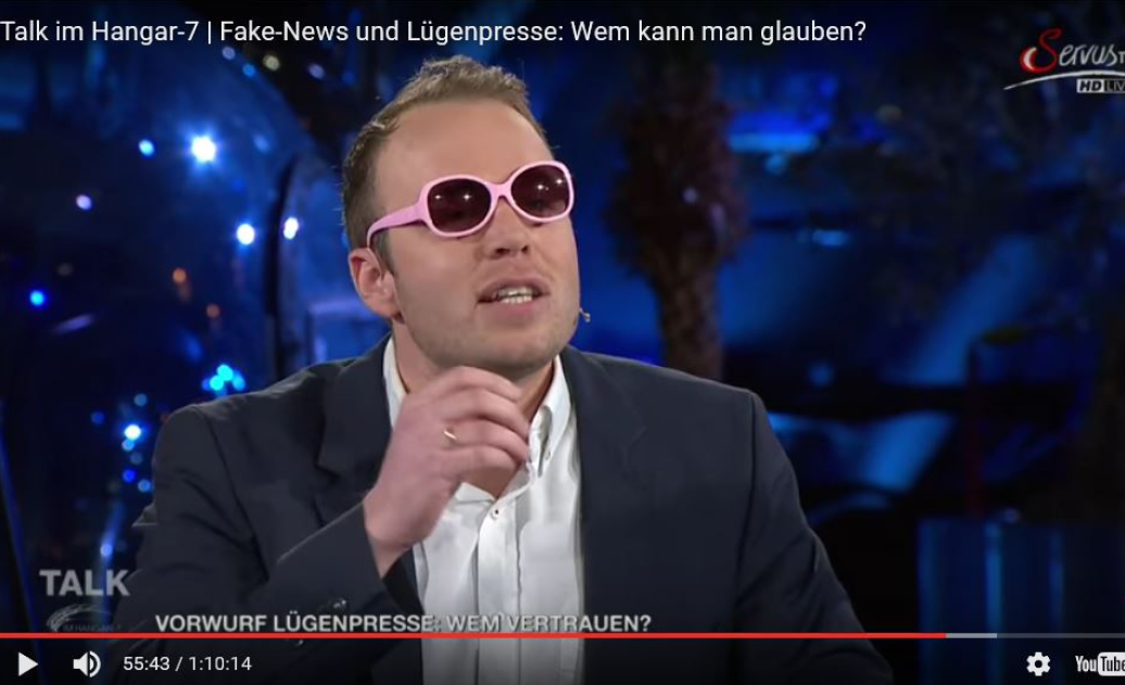 Info-DIREKT Gastautor Stefan Magnet mit rosa Brille